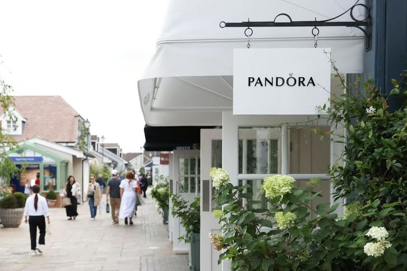 Pandora considers licensing assets in China amid market slump. - Reuters